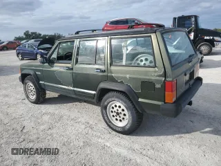 1996 Jeep Cherokee SE z VIN 1J4FJ28S9TL211073, wystawiony jako Copart lot #78052574 z przebiegiem 174 967 mil mil oraz Nie do naprawy • Non repairable. Historia ofert i sprzedaży dostępna na DreamBid. Obrazek 2.