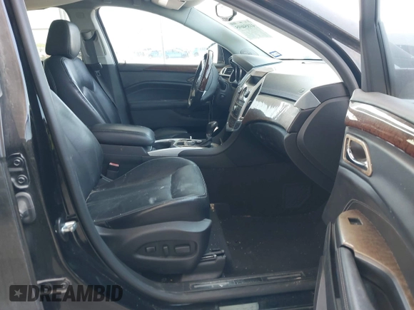 2012 Cadillac SRX Premium Collection with VIN 3GYFNCE39CS548523, listed as a IAAI auction lot 41854695 with 145,311 mi miles and . Bid and sale history available at DreamBid. Image 5.
