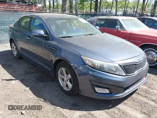 2015 Kia Optima LX z VIN 5XXGM4A78FG437581, wystawiony jako IAAI lot #42056612 z przebiegiem 190 934 mil mil oraz . Historia ofert i sprzedaży dostępna na DreamBid. Obrazek 1.