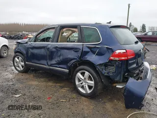 2012 Volkswagen Touareg Lux z VIN WVGEK9BP1CD009751, wystawiony jako IAAI lot #41240224 z przebiegiem Nie podano mil oraz . Historia ofert i sprzedaży dostępna na DreamBid. Obrazek 3.
