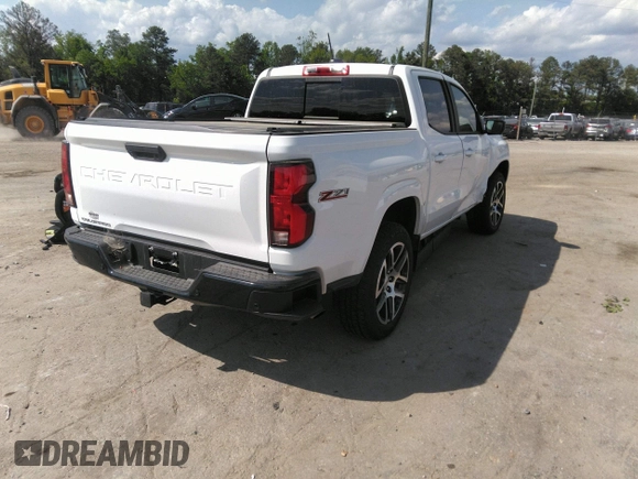 2023 Chevrolet Colorado 4WD Z71 with VIN 1GCPTDEK4P1249624, listed as a IAAI auction lot 42130950 with 9,795 mi miles and . Bid and sale history available at DreamBid. Image 4.