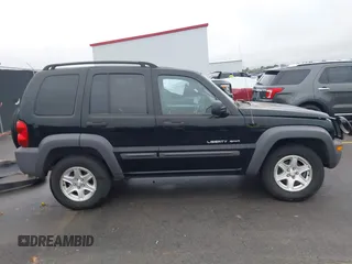 2003 Jeep Liberty Sport with VIN 1J4GK48KX3W656837, listed as a IAAI auction lot 40785615 with 164,450 mi miles and . Bid and sale history available at DreamBid. Image 13.