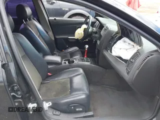 2004 Cadillac CTS-V z VIN 1G6DN57S240161160, wystawiony jako IAAI lot #42251504 z przebiegiem 160 126 mil mil oraz . Historia ofert i sprzedaży dostępna na DreamBid. Obrazek 5.