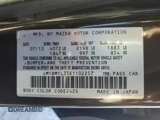 2014 Mazda 3 S Touring with VIN JM1BM1L35E1102257, listed as a Copart auction lot 46779745 with 170,441 mi miles and Salvage Title. Bid and sale history available at DreamBid. Image 12.