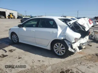 2009 Toyota Corolla with VIN 1NXBU40E69Z049866, listed as a Copart auction lot 52078625 with 149,943 mi miles and Salvage Title. Bid and sale history available at carsss.com. Image 2.