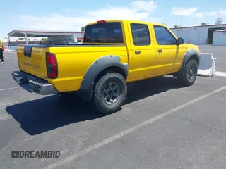 2001 Nissan Frontier SE z VIN 1N6ED27T61C355015, wystawiony jako IAAI lot #42381391 z przebiegiem Nie podano mil oraz . Historia ofert i sprzedaży dostępna na DreamBid. Obrazek 4.