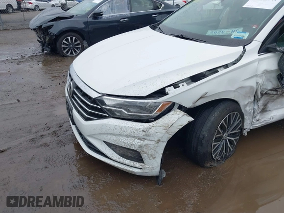 2021 Volkswagen Jetta S z VIN 3VWC57BU9MM103778, wystawiony jako IAAI lot #42493041 z przebiegiem 74 723 mil mil oraz . Historia ofert i sprzedaży dostępna na DreamBid. Obrazek 17.