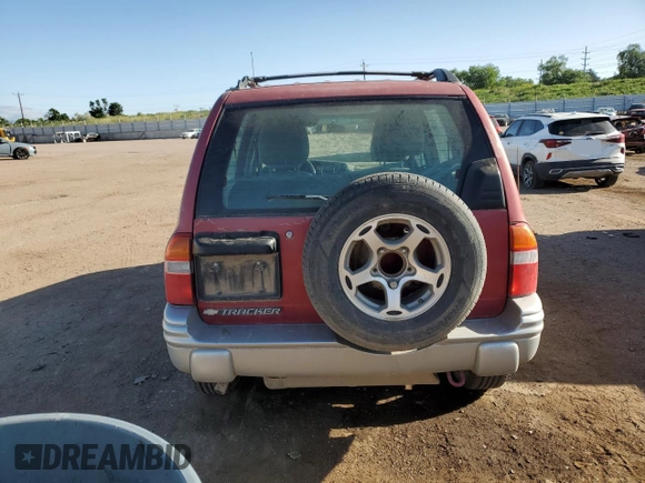 2001 Chevrolet Tracker LT z VIN 2CNBJ634716945832, wystawiony jako Copart lot #61967345 z przebiegiem 136 403 mil mil oraz Szkoda całkowita • Salvage title. Historia ofert i sprzedaży dostępna na DreamBid. Obrazek 6.