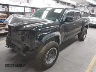 2021 Toyota Tacoma SR with VIN 3TMCZ5AN4MM448304, listed as a IAAI auction lot 42046932 with 56,161 mi miles and . Bid and sale history available at DreamBid. Image 17.