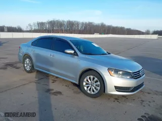 2015 Volkswagen Passat 1.8T Limited Edition with VIN 1VWAT7A30FC040113, listed as a IAAI auction lot 41227981 with 111,068 mi miles. Bid and sale history available at carsss.com. Image 1.