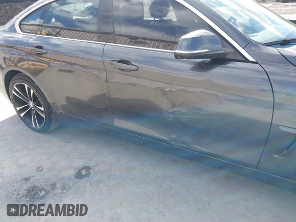 2016 BMW 4 Series 428i xDrive with VIN WBA4C9C56GG140427, listed as a IAAI auction lot 41886670 with 94,426 mi miles and . Bid and sale history available at carsss.com. Image 6.
