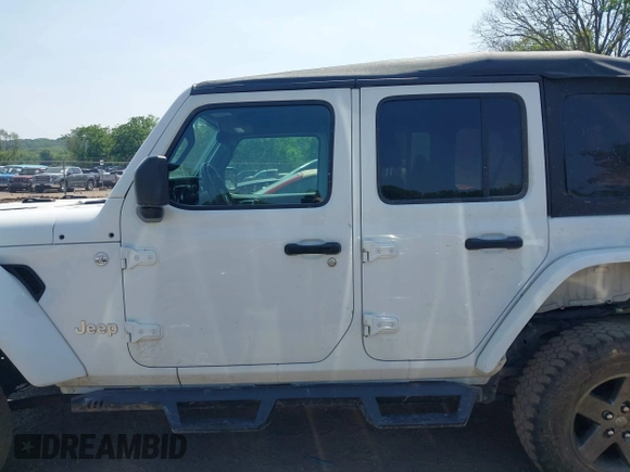 2018 Jeep Wrangler Unlimited Sport S with VIN 1C4HJXDGXJW146873, listed as a IAAI auction lot 42404813 with 73,929 mi miles and . Bid and sale history available at DreamBid. Image 15.