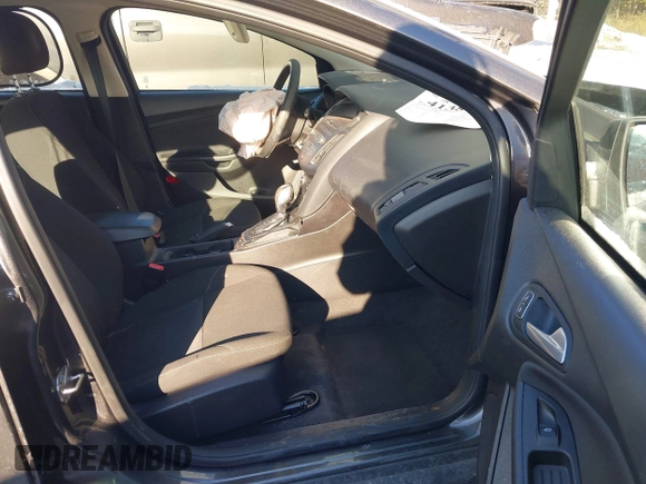 2015 Ford Focus SE with VIN 1FADP3F24FL276766, listed as a IAAI auction lot 41388348 with 59,579 mi miles. Bid and sale history available at carsss.com. Image 5.