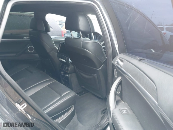 2012 BMW X6 M with VIN 5YMGZ0C58CLK14885, listed as a IAAI auction lot 42082928 with 131,900 mi miles. Bid and sale history available at carsss.com. Image 8.