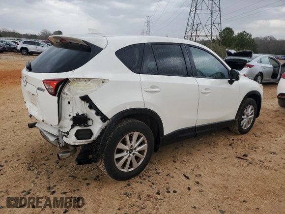2014 Mazda CX-5 Touring with VIN JM3KE2CY1E0379158, listed as a Copart auction lot 50085935 with 90,340 mi miles and Salvage Title. Bid and sale history available at carsss.com. Image 3.