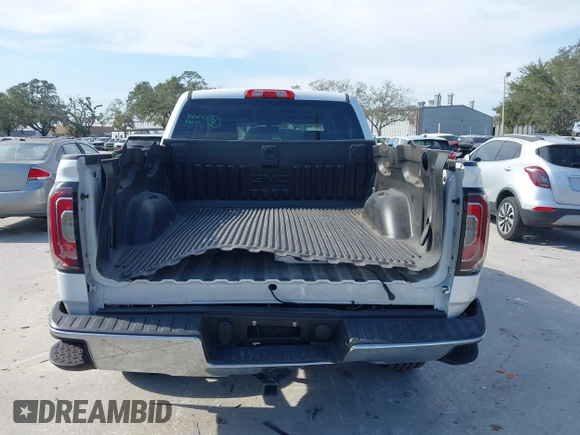 2017 GMC Sierra 1500 SLT with VIN 3GTP1NECXHG423591, listed as a IAAI auction lot 41509177 with 100,071 mi miles and . Bid and sale history available at DreamBid. Image 16.