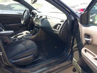 2014 Chrysler 200 Touring with VIN 1C3CCBBB6EN140731, listed as a IAAI auction lot 41987771 with 218,148 mi miles. Bid and sale history available at carsss.com. Image 5.