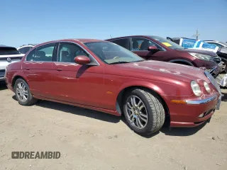 2003 Jaguar S-Type z VIN SAJEA01U13HM90556, wystawiony jako Copart lot #59578535 z przebiegiem 50 723 mil mil oraz Czysty tytuł • Clean title. Historia ofert i sprzedaży dostępna na DreamBid. Obrazek 4.