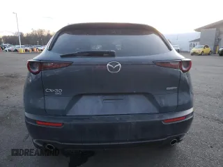 2023 Mazda CX-30 S Carbon Edition с VIN 3MVDMBCM3PM500403, выставлен на аукционе Copart как лот 88146095 с пробегом 29 861 миль миль и Списание • Salvage title. История ставок и продаж доступна на DreamBid. Изображение 6.