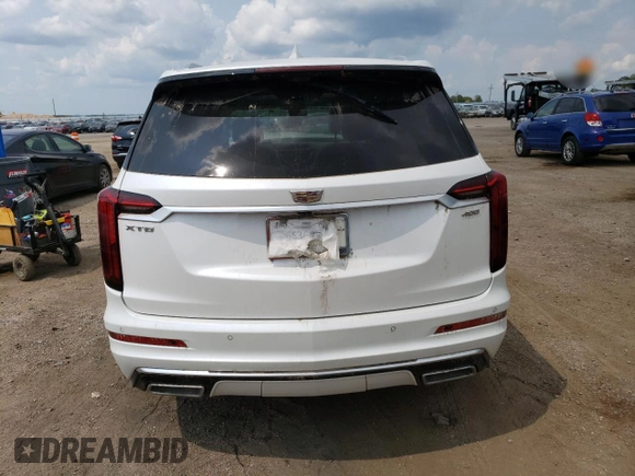 2021 Cadillac XT6 Premium Luxury with VIN 1GYKPCRS5MZ167010, listed as a Copart auction lot 63780174 with 0 mi miles and Salvage Title. Bid and sale history available at carsss.com. Image 6.