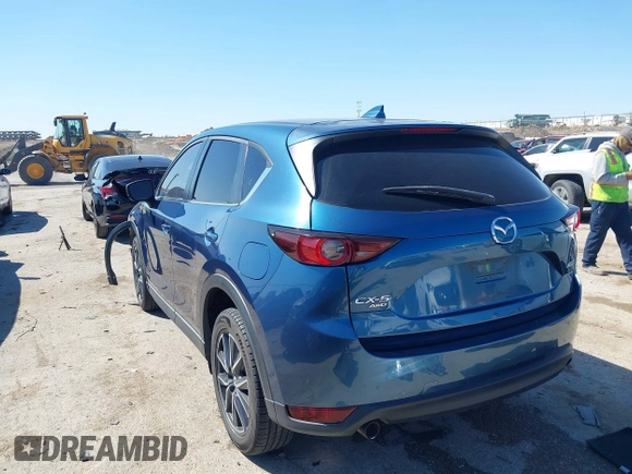 2018 Mazda CX-5 Touring with VIN JM3KFBCM0J0302916, listed as a IAAI auction lot 41837733 with 100,765 mi miles. Bid and sale history available at carsss.com. Image 3.