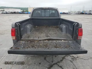 2002 Dodge Dakota с VIN 1B7FL46XX2S511526, выставлен на аукционе Copart как лот 57955594 с пробегом 244 367 миль миль и Списание • Salvage title. История ставок и продаж доступна на DreamBid. Изображение 6.