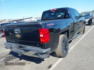 2015 Chevrolet Silverado 1500 LT with VIN 1GCVKREC5FZ236235, listed as a IAAI auction lot 41936044 with 121,358 mi miles and . Bid and sale history available at DreamBid. Image 4.