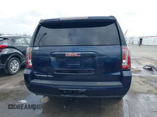 2017 GMC Yukon XL SLT with VIN 1GKS1GKC0HR319058, listed as a IAAI auction lot 41667612 with 116,695 mi miles and . Bid and sale history available at carsss.com. Image 16.
