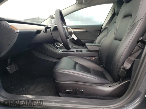 2023 Tesla Model 3 with VIN 5YJ3E1EA7PF395196, listed as a Copart auction lot 51260465 with 41,119 mi miles and Salvage title. Bid and sale history available at DreamBid. Image 7.