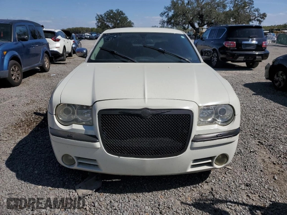 2005 Chrysler 300 with VIN 2C3AA63H35H504149, listed as a Copart auction lot 46455655 with 128,617 mi miles and Salvage Title. Bid and sale history available at carsss.com. Image 5.