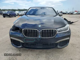 2019 BMW 7 Series M760i xDrive with VIN WBA7H6C58KG615081, listed as a Copart auction lot 59361704 with 92,769 mi miles and Salvage Title. Bid and sale history available at carsss.com. Image 5.