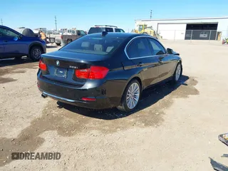 2012 BMW 3 Series 328i with VIN WBA3A5C58CF256254, listed as a IAAI auction lot 41676209 with 68,893 mi miles. Bid and sale history available at carsss.com. Image 4.