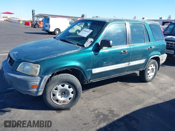 1999 Honda CR-V LX with VIN JHLRD1847XC031475, listed as a IAAI auction lot 41606369 with 254,445 mi miles. Bid and sale history available at carsss.com. Image 2.
