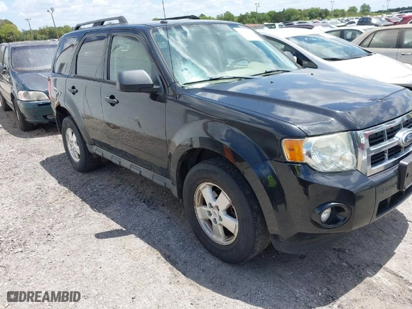 2011 Ford Escape XLT with VIN 1FMCU9D77BKA45274, listed as a IAAI auction lot 42073521 with 245,073 mi miles. Bid and sale history available at carsss.com. Image 1.