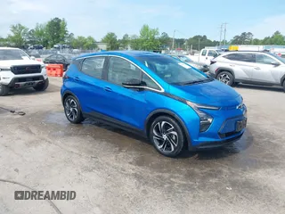 2023 Chevrolet Bolt EV 2LT z VIN 1G1FX6S05P4128607, wystawiony jako IAAI lot #42081752 z przebiegiem 22 551 mil mil oraz . Historia ofert i sprzedaży dostępna na DreamBid. Obrazek 1.