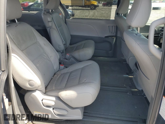2015 Toyota Sienna XLE с VIN 5TDYK3DC7FS600281, выставлен на аукционе Copart как лот 53738065 с пробегом 91 207 миль миль и Списание • Salvage title. История ставок и продаж доступна на DreamBid. Изображение 11.