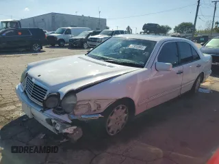 1999 Mercedes-Benz E-Class with VIN WDBJF65HXXA914389, listed as a Copart auction lot 72935884 with 192,084 mi miles and Salvage Title. Bid and sale history available at carsss.com. Image 1.