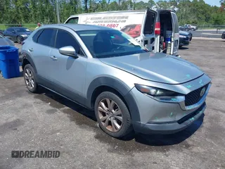 2021 Mazda CX-30 Select with VIN 3MVDMABL5MM235031, listed as a IAAI auction lot 42589583 with 83,253 mi miles and . Bid and sale history available at DreamBid. Image 1.