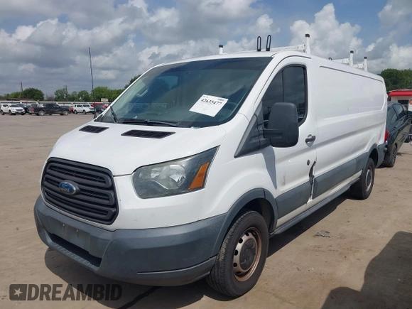 2015 Ford Transit Cargo with VIN 1FTYR2ZM2FKA86869, listed as a IAAI auction lot 42635477 with 14,695 mi miles and . Bid and sale history available at DreamBid. Image 2.