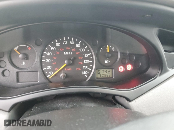 2000 Ford Focus SE with VIN 1FAFP3634YW278181, listed as a Copart auction lot 89372555 with 160,885 mi miles and Salvage Title. Bid and sale history available at DreamBid. Image 9.