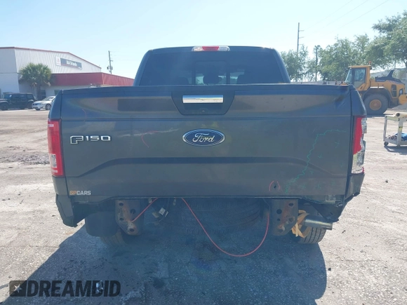 2015 Ford F-150 XL with VIN 1FTEW1CG2FFC70680, listed as a IAAI auction lot 41871782 with 143,875 mi miles. Bid and sale history available at carsss.com. Image 16.