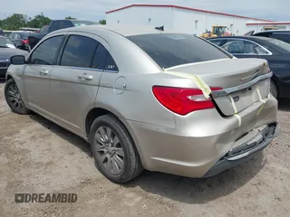 2013 Chrysler 200 LX with VIN 1C3CCBAB2DN733471, listed as a IAAI auction lot 42016020 with 182,681 mi miles and . Bid and sale history available at DreamBid. Image 3.