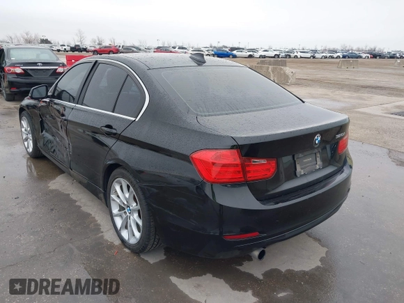 2015 BMW 3 Series 320i with VIN WBA3B1G5XFNT02032, listed as a IAAI auction lot 41581535 with 170,114 mi miles. Bid and sale history available at carsss.com. Image 3.