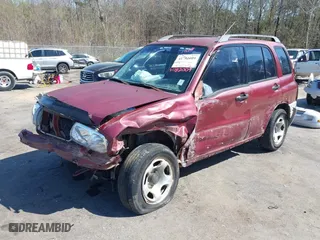 2000 Suzuki Grand Vitara with VIN JS3TE62V5Y4102944, listed as a IAAI auction lot 41782009 with 179,765 mi miles. Bid and sale history available at carsss.com. Image 18.