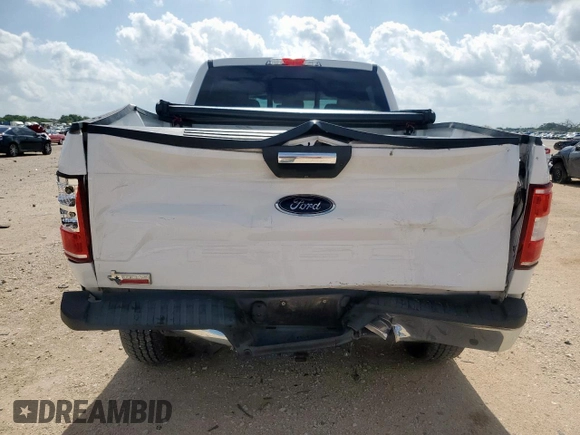 2018 Ford F-150 XL with VIN 1FTFW1E52JKE57028, listed as a Copart auction lot 61970095 with 95,475 mi miles and Salvage title. Bid and sale history available at DreamBid. Image 6.