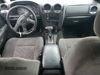 2006 GMC Envoy SLT with VIN 1GKDT13S562265042, listed as a Copart auction lot 83824444 with 0 mi miles and Salvage Title. Bid and sale history available at carsss.com. Image 8.