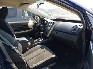 2010 Mazda CX-7 Sport with VIN JM3ER2W59A0328990, listed as a IAAI auction lot 41787431 with 163,443 mi miles and . Bid and sale history available at DreamBid. Image 5.
