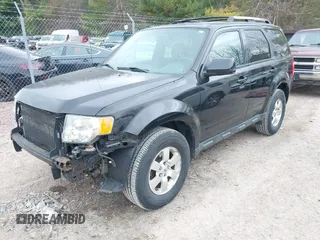 2011 Ford Escape Limited with VIN 1FMCU9EG7BKA49937, listed as a IAAI auction lot 42067837 with 223,181 mi miles. Bid and sale history available at carsss.com. Image 2.