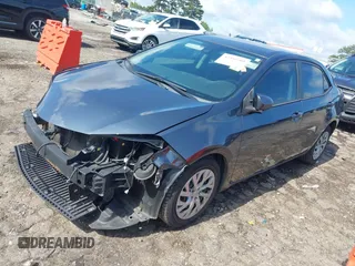 2018 Toyota Corolla L с VIN 2T1BURHE3JC049489, выставлен на аукционе IAAI как лот 42456500 с пробегом 98 788 миль миль и . История ставок и продаж доступна на DreamBid. Изображение 17.