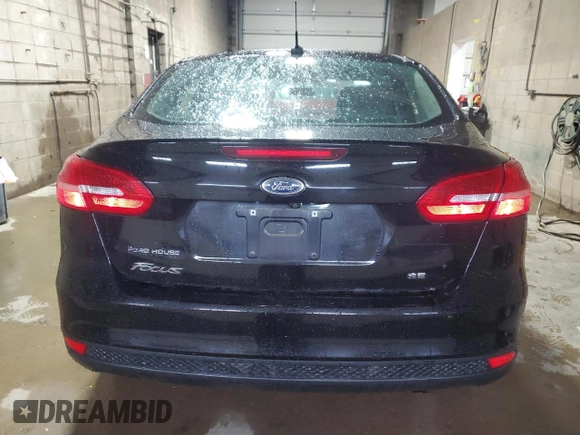 2017 Ford Focus SE with VIN 1FADP3F23HL244667, listed as a Copart auction lot 57597125 with 166,730 mi miles and Salvage title. Bid and sale history available at DreamBid. Image 6.